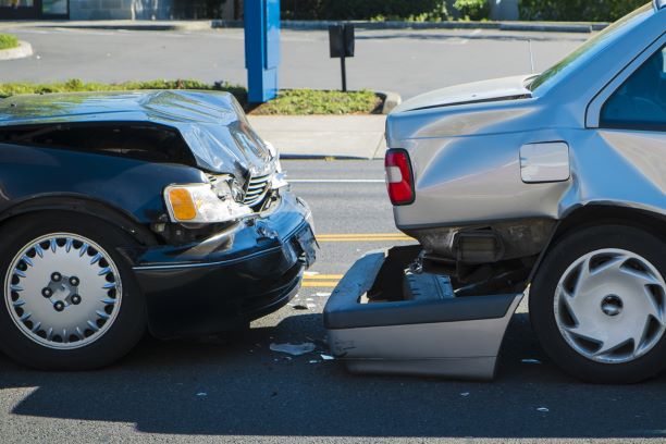 two passenger cars on the road after an accident